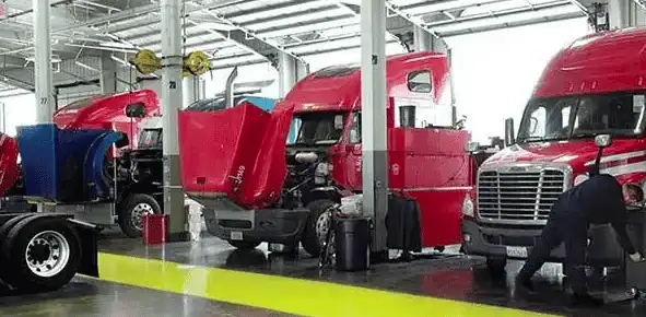Trucks being maintained